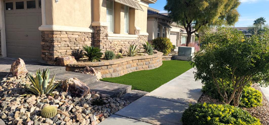 Desert-style front yard with stone landscaping.